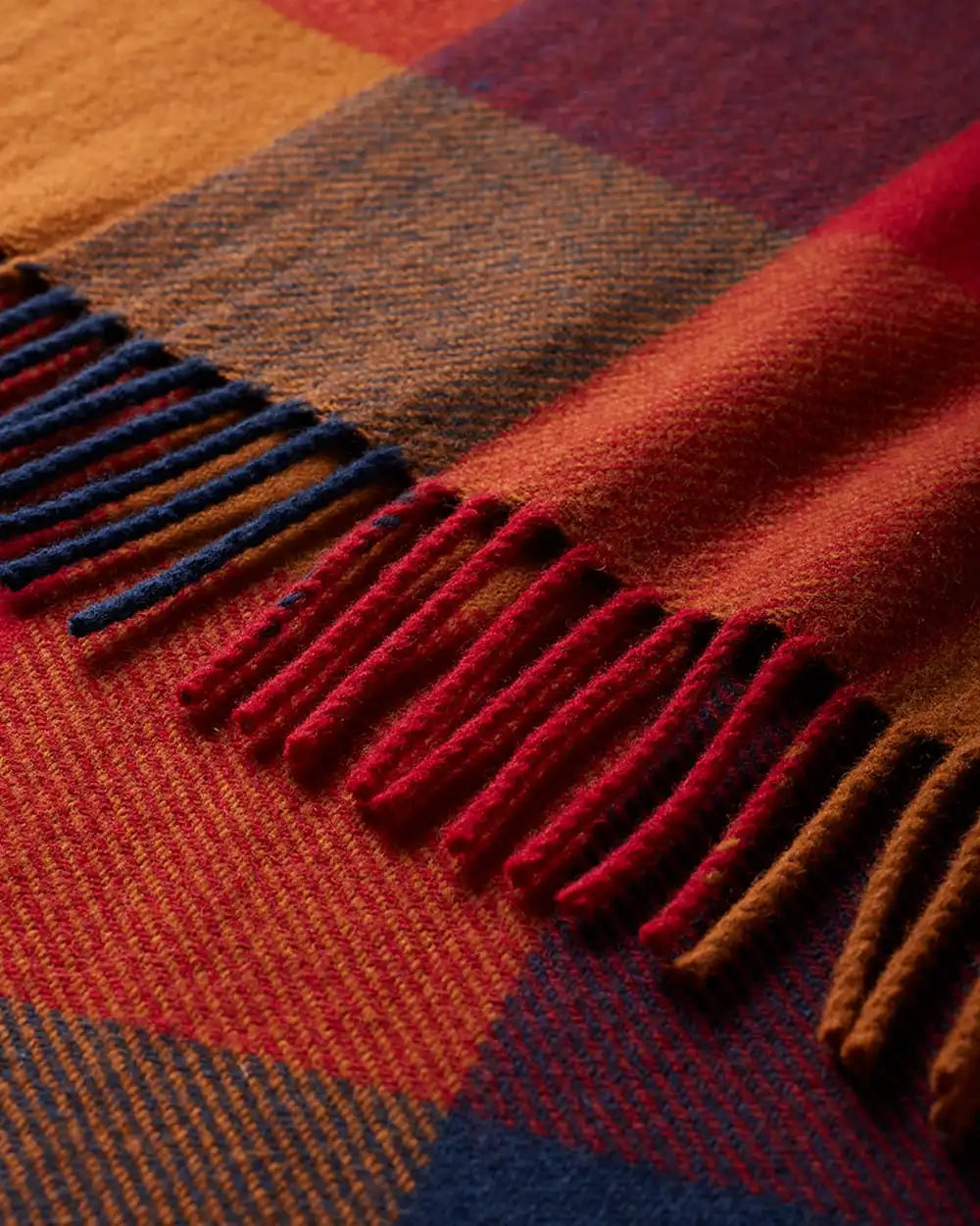 ECO-WISE WOOL FRINGED THROW